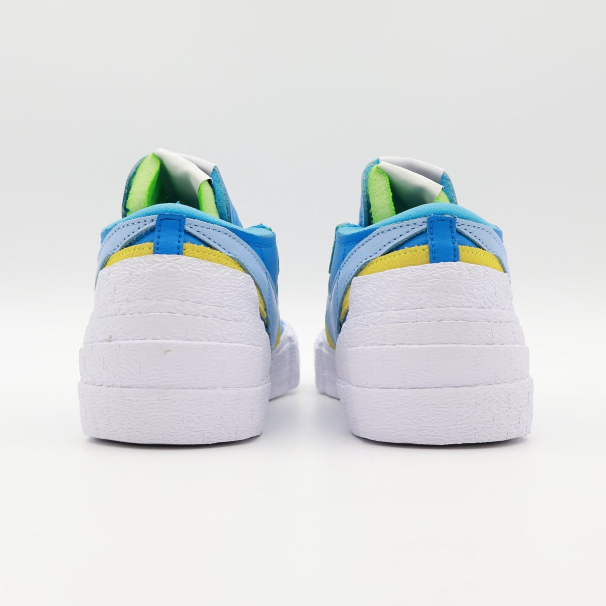 DM7901-400 KAWS sacai Nike Blazer Low Neptune Blue Light Pink Yellow (Men's)