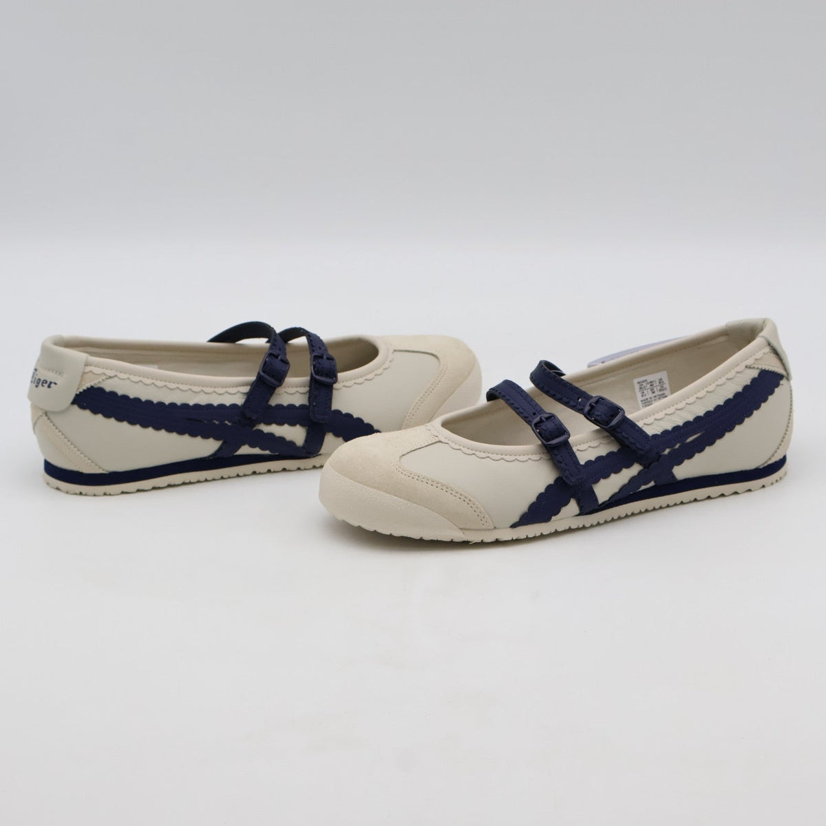 1182A678-200 Onitsuka Tiger Mexico 66 TGRS Birch Peacoat (Women's)