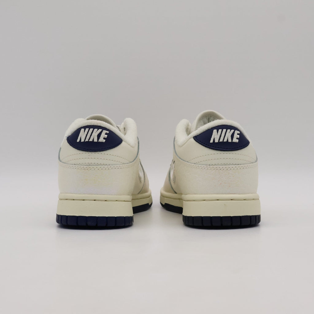 IM6571-027 Nike Dunk Low Mini Swoosh Soft Pearl (Women's)