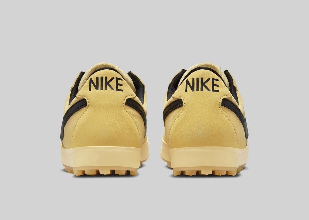 IH2341-700 Nike Astro Grabber Soft Yellow Black (Men's)